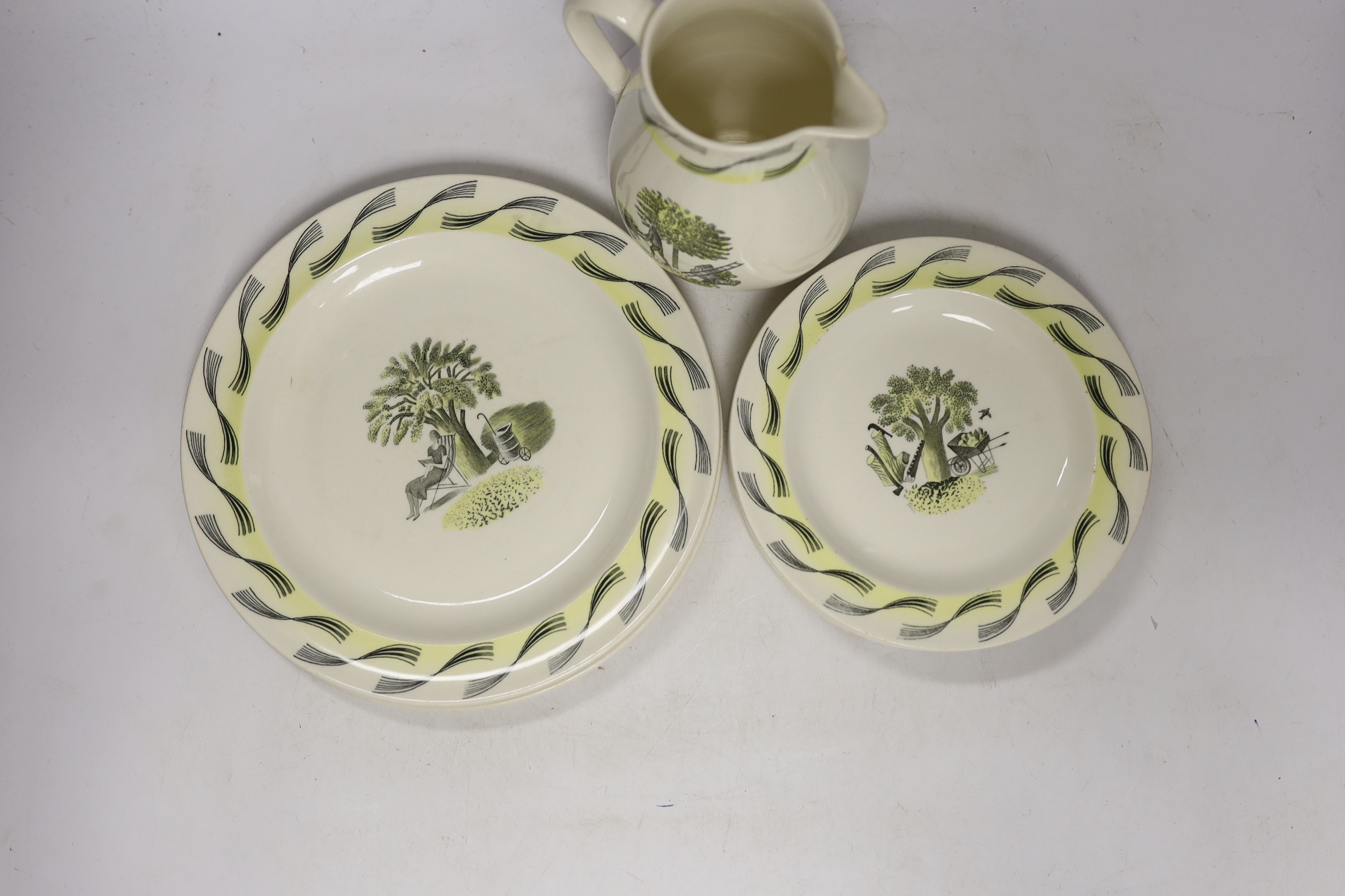 Eric Ravilious for Wedgwood, six garden pattern plates and a jug, largest 24cm in diameter